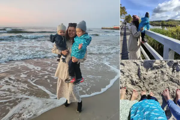 Kobieta z dziećmi na plaży i spacerze w Kołobrzegu.